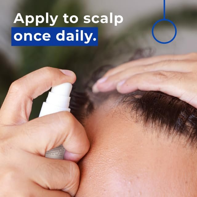 Close up of spray application to the scalp